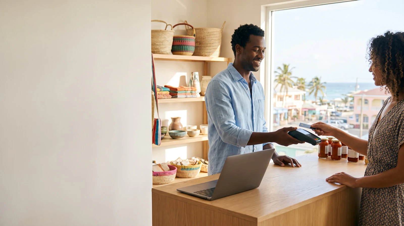 A Caribbean shop owner accepting an online card payment on her Shopify store — Paperless Blueprint PowerTranz payment gateway integration