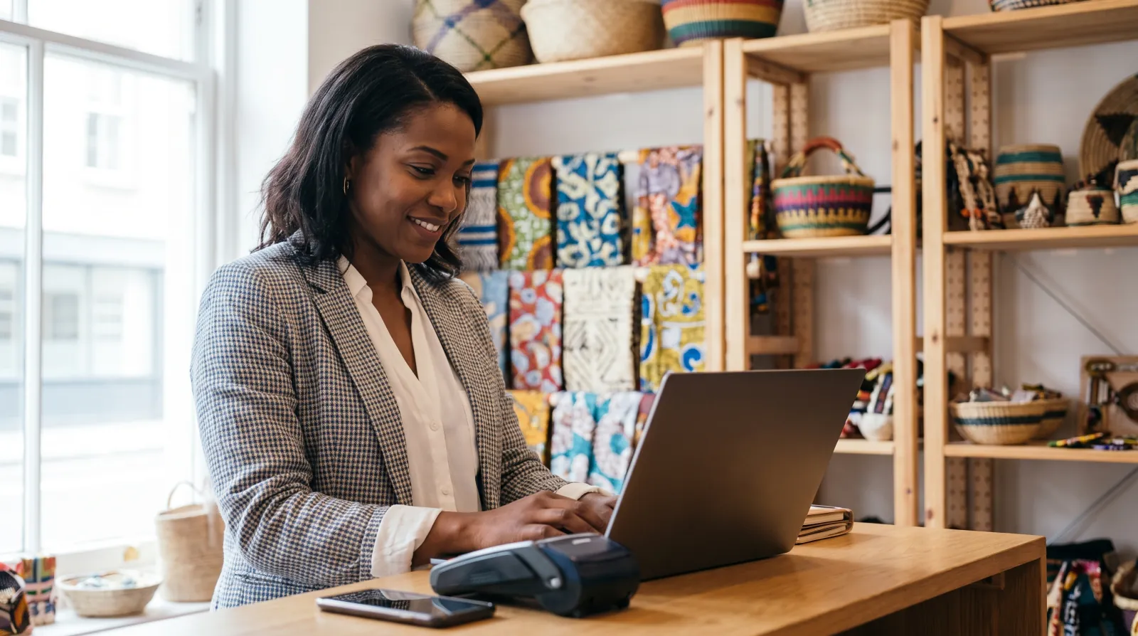 Trinidad boutique owner taking an online card payment on her Shopify store — Paperless Blueprint YOOZ payment gateway integration